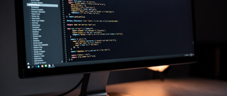 A sleek monitor displaying amber terminal code and a steel cryptographic key, representing a smart contract bridge cli.